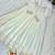 White silk blend embroidered flared gown set