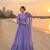 Purple faux georgette embroidered flared gown set