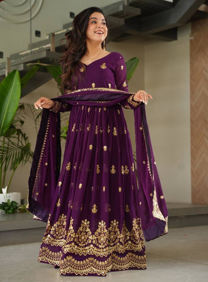 Purple faux georgette embroidered flared gown set