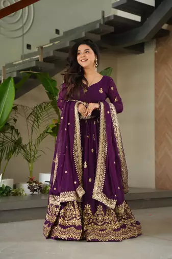 Purple faux georgette embroidered flared gown set
