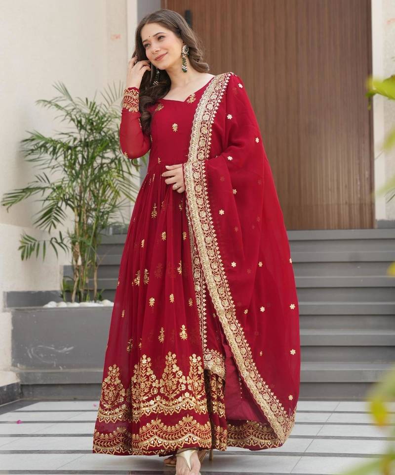 Maroon faux georgette embroidered flared gown set