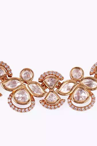 elegant leaf design uncut kundan stone 18 kt gold plated brass choker jewellery set for women