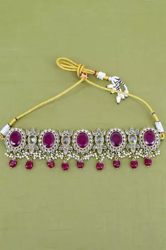 charming circle and leaf design red uncut kundan gold plated collar jewellery set for women