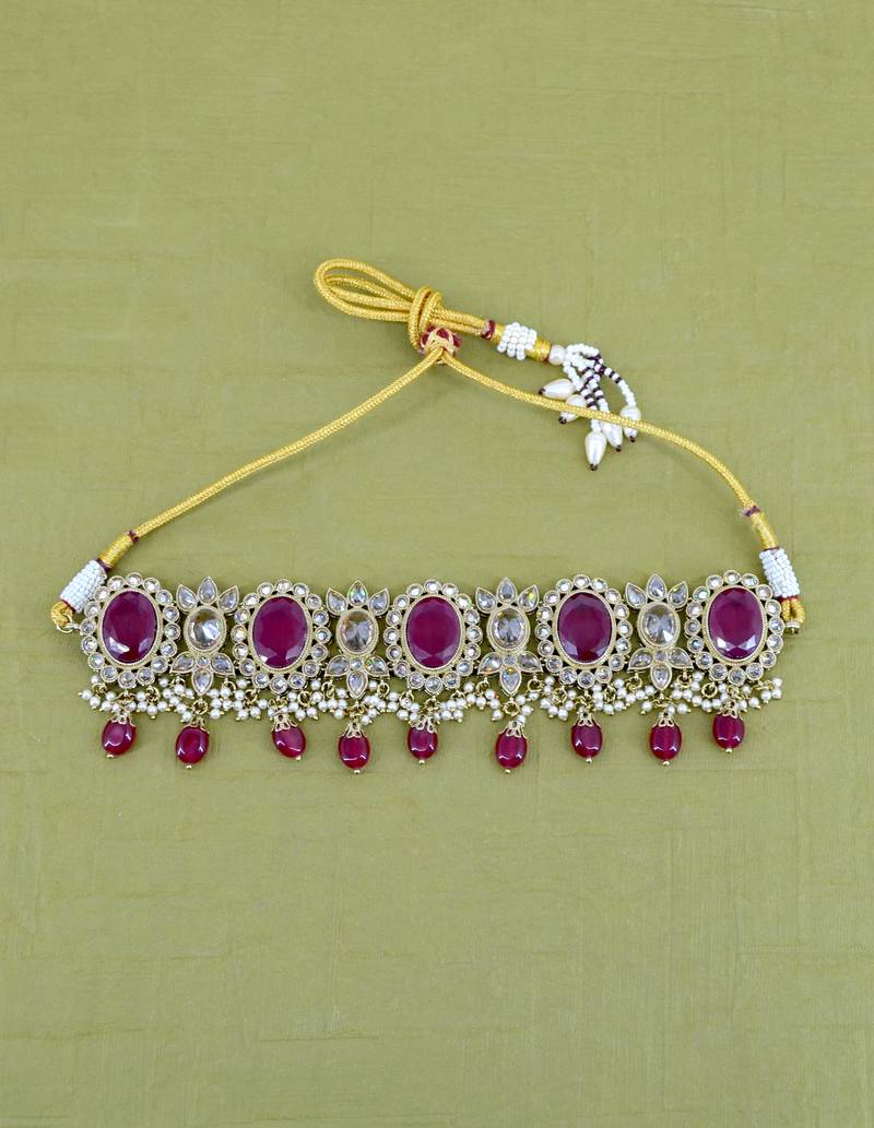 charming circle and leaf design red uncut kundan gold plated collar jewellery set for women