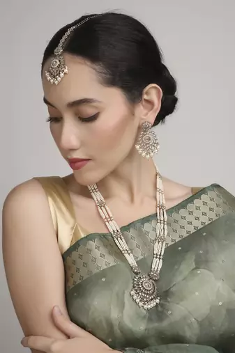 delightful round shape pearl lariat kundan antique gold plated long haram jewellery set for women