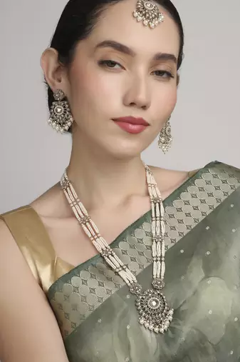 delightful round shape pearl lariat kundan antique gold plated long haram jewellery set for women