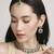 dazzling round and circle shape brass kundan antique gold plated choker jewellery set for women