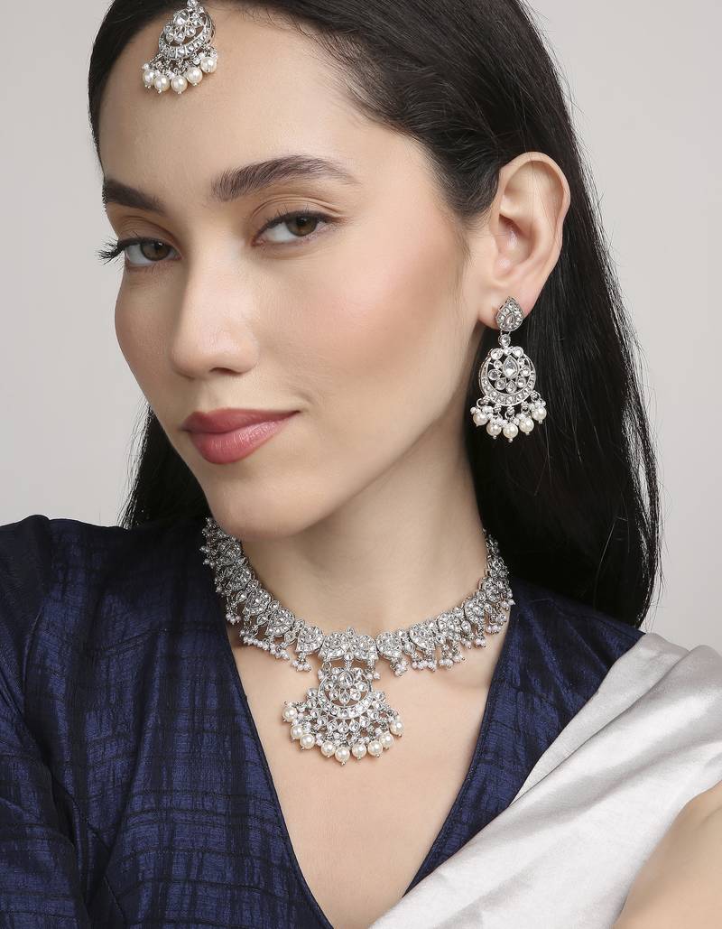 marvellous paisley design half-moon shape kundan silver plated choker jewellery set for women