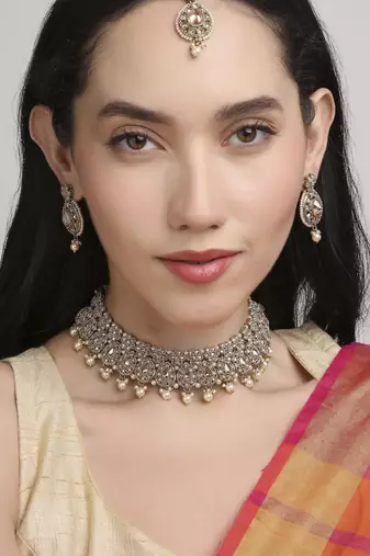 lavish flower and oval shape kundan antique gold plated choker jewellery set for women