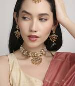 glimmery oval and leaf pearl lariat brass kundan antique gold plated choker jewellery set for women