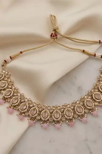 splendid oval and leaf shape pink pearl kundan gold plated choker jewellery set for women