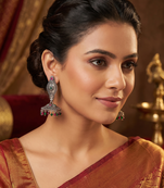Oxidized silver ethnic jhumka earrings with pink & green stones