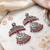 Oxidized silver peacock chandbali earrings with pink beads