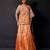 Saffron orange embroidered tissue drape saree set