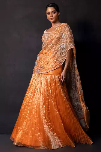 Saffron orange embroidered tissue drape saree set