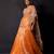 Saffron orange embroidered tissue drape saree set