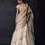 Champagne gold embroidered tissue drape saree set