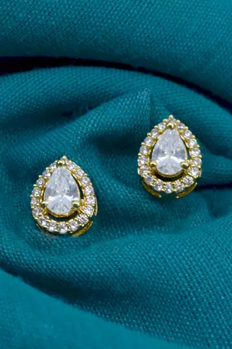trendy oval shape cz studded brass gold plated stud earring for women and girls
