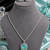 Rhodium finish prism glow necklace set