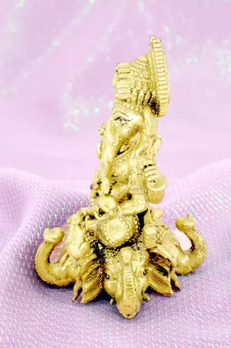 traditional god ganesha sitting on elephant brass gold plated idol(murti)