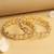 traditional round shape white kundan stone gold plated set of 2 bangle set for women
