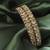 smooth round shape antique gold plated light green uncut kundan stone set of 2 bangle set for women