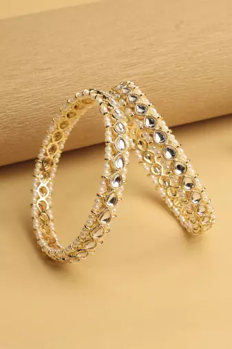 traditional oval shape pearl white kundan stone gold plated set of 2 bangle set for women