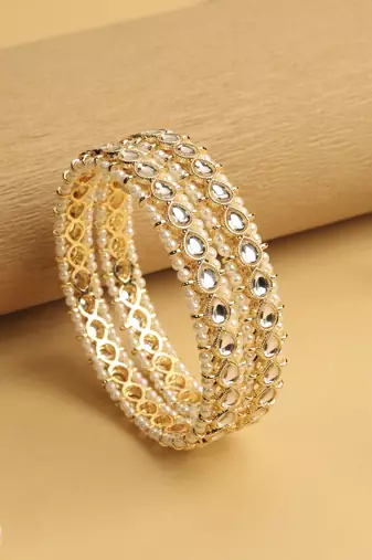 traditional oval shape pearl white kundan stone gold plated set of 2 bangle set for women