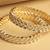 traditional oval shape white kundan stone gold plated set of 2 bangle set for women