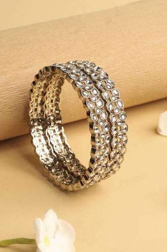 trendy oval shape white kundan stone antique gold plated set of 2 bangle set for women
