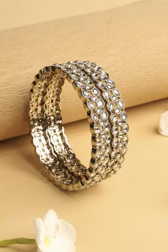 trendy oval shape white kundan stone antique gold plated set of 2 bangle set for women