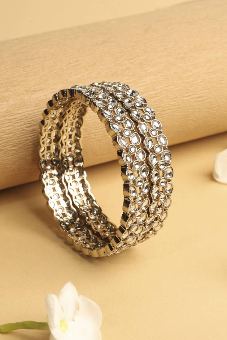 trendy oval shape white kundan stone antique gold plated set of 2 bangle set for women