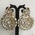 White stone studded round motif earrkings with maang tikka set for women