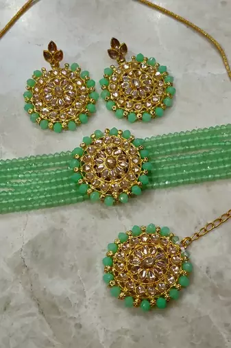 mint green kundan choker set with maang tikka