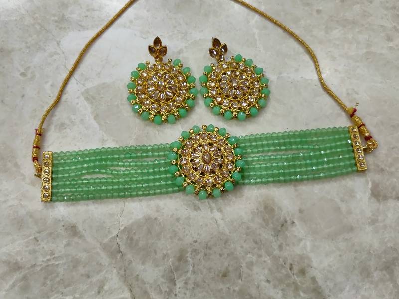 mint green kundan choker set with maang tikka