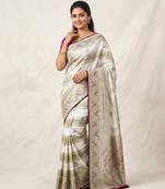 White Color Meenakari Bird Figure Weaving And Dubbal Jari Weaving Bird Figure Strip Crepe Georgette Saree