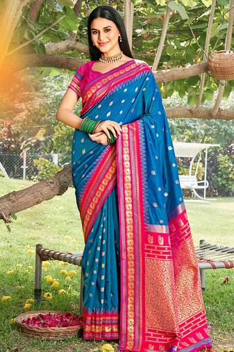 Royal blue & rani pink banarasi silk blend saree with zari woven border