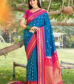 Royal blue & rani pink banarasi silk blend saree with zari woven border