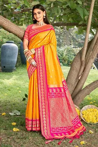 Mustard & rani pink banarasi silk blend saree with zari woven border