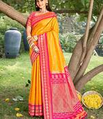Mustard & rani pink banarasi silk blend saree with zari woven border