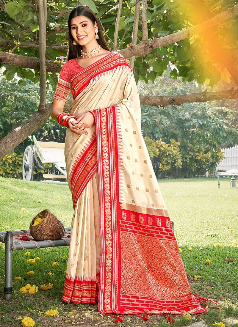 Off white & red banarasi silk blend saree with zari woven border