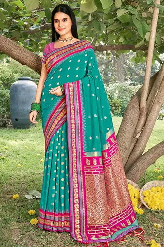 Teal & rani pink banarasi silk blend saree with zari woven border
