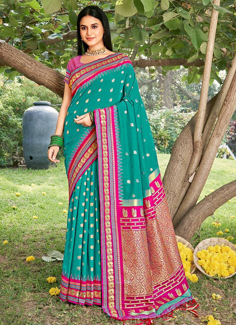 Teal & rani pink banarasi silk blend saree with zari woven border