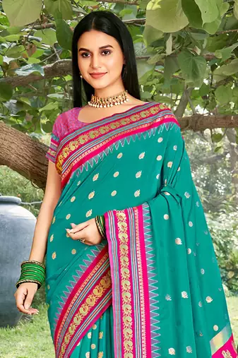 Teal & rani pink banarasi silk blend saree with zari woven border