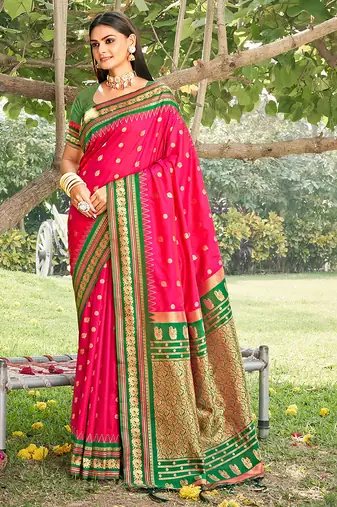 Rani pink & green banarasi silk blend saree with zari woven border