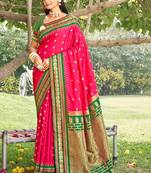 Rani pink & green banarasi silk blend saree with zari woven border