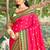 Rani pink & green banarasi silk blend saree with zari woven border
