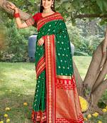 Dark green & red banarasi silk blend saree with zari woven border