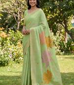 Pastel green linen cotton blend saree with floral woven pallu & zari border