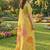 Pastel yellow linen cotton blend saree with floral woven pallu & zari border